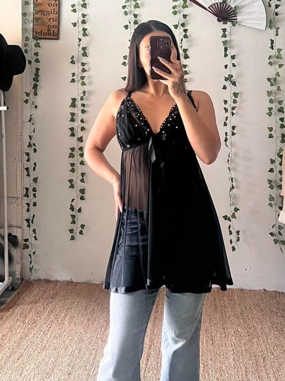 Black sheer slip mini dress with lace floral bust and sequin details